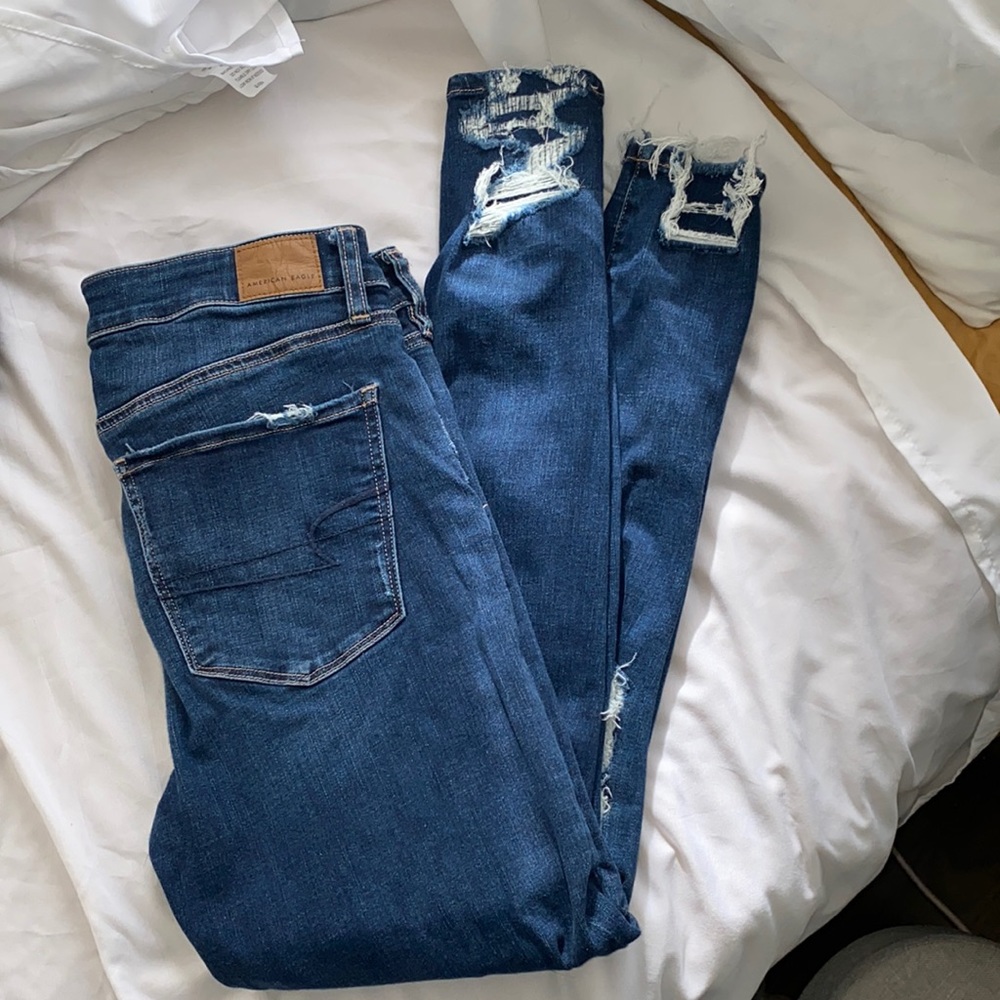 AE, high rise jeggings cropped, 12 long, dark wash and distressed.